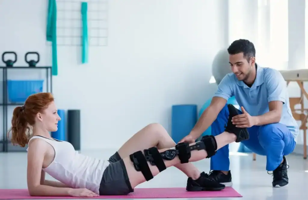 Woman having treatment to help muscle recovery Melksham after an injury